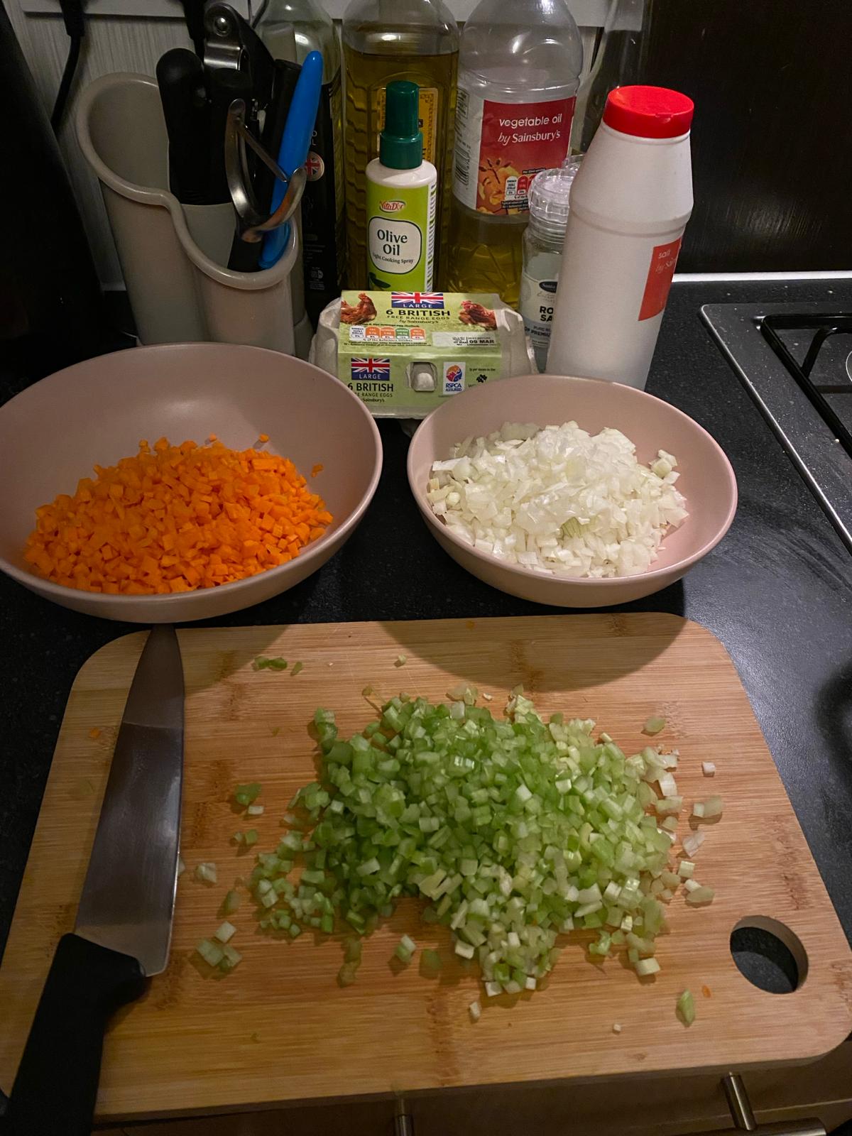 Photo of finely chopped carrot, celery and onion.